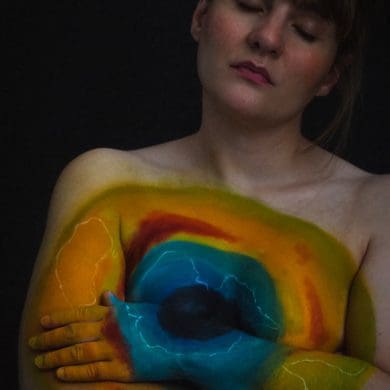 Ruth Madeley wear a body painting depicting the ozone hole over the Antarctic.