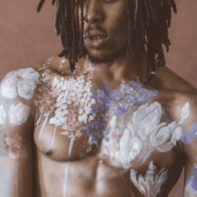 An abstract traditional English garden painted on the body of a Black man